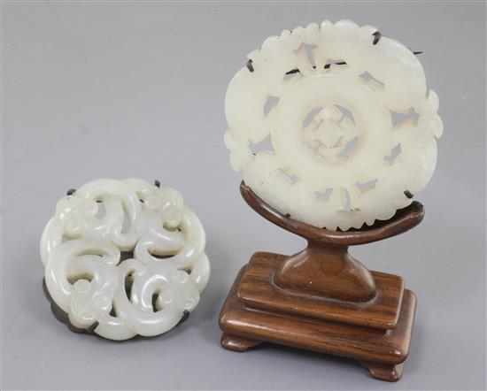 Two Chinese pale celadon jade bi discs, 18th/19th century, 5.4cm,